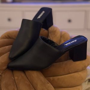 Black slip in short heeled shoes